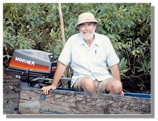 Papa John in his canoe in Papua New Guinea.