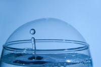 Water Drop in a Glass