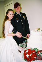 Joy and Jeremy cutting the cake