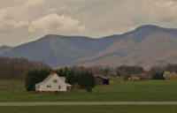 JPEG house next to the mountain